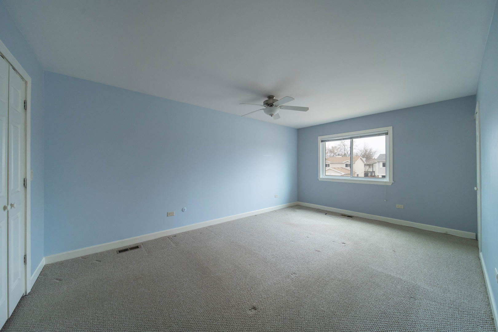 1504 Chippewa Trail Wheeling, IL 60090 - Photo 17 of 28 an empty room with a window