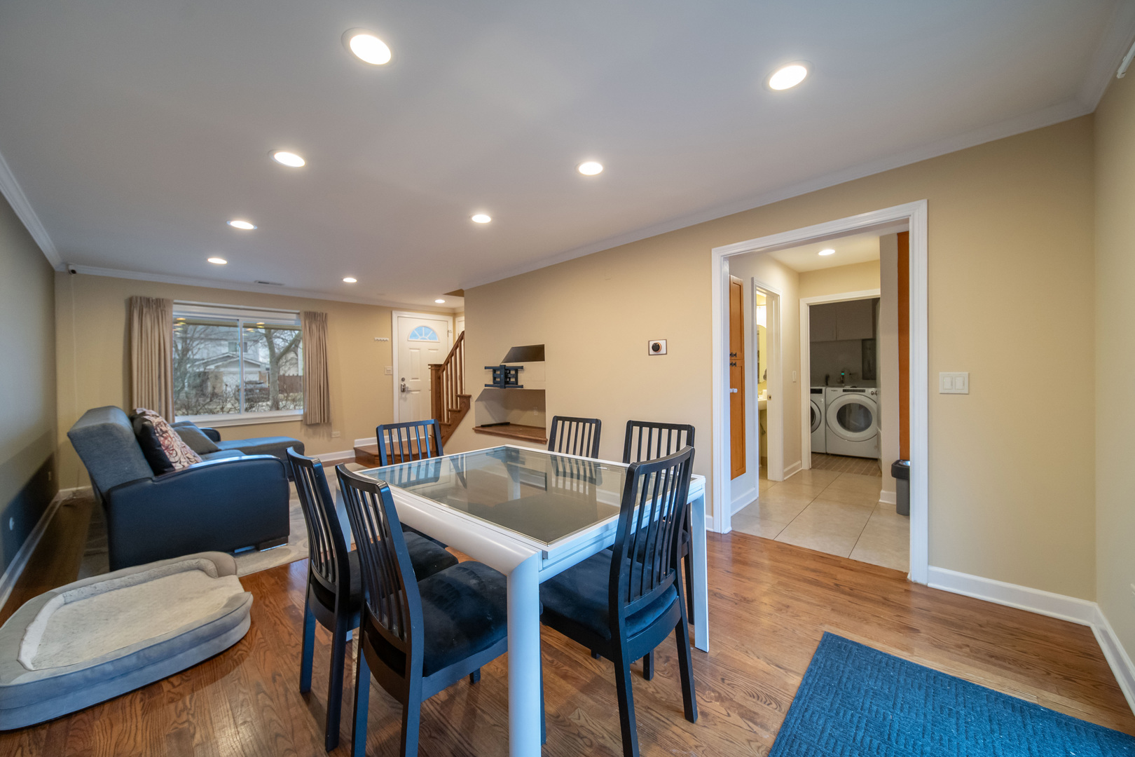 1504 Chippewa Trail Wheeling, IL 60090 - Photo 6 of 28 a view of a dining room with furniture and wooden floor
