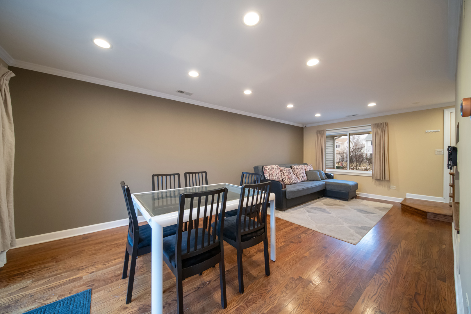 1504 Chippewa Trail Wheeling, IL 60090 - Photo 7 of 28 a living room with furniture and wooden floor