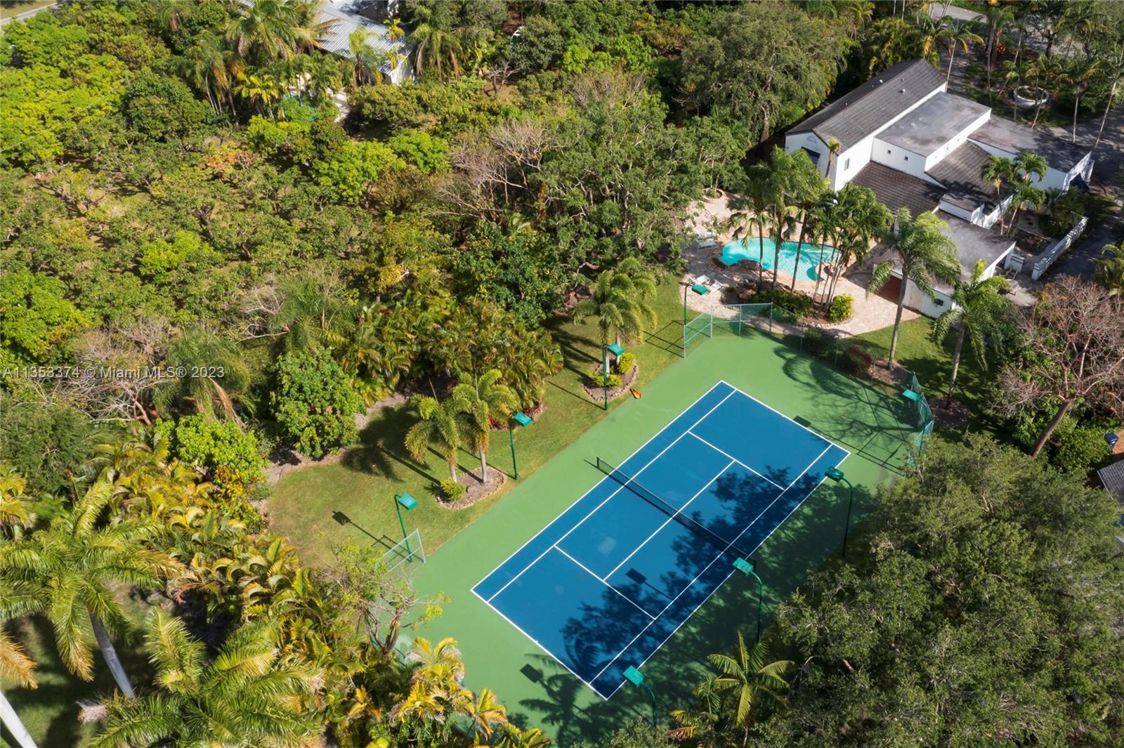 6745 Southwest 94th Street Pinecrest, FL 33156 - Photo 1 of 24 an aerial view of a house