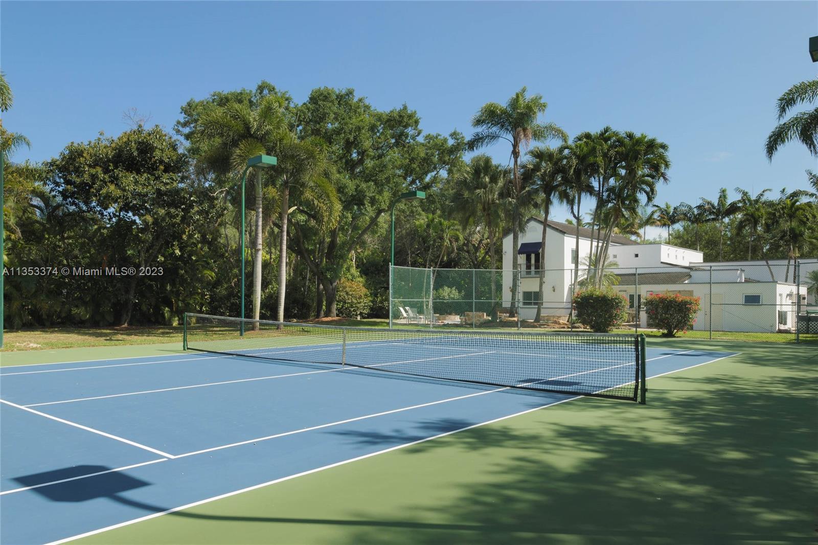 6745 Southwest 94th Street Pinecrest, FL 33156 - Photo 17 of 24 a view of a tennis court