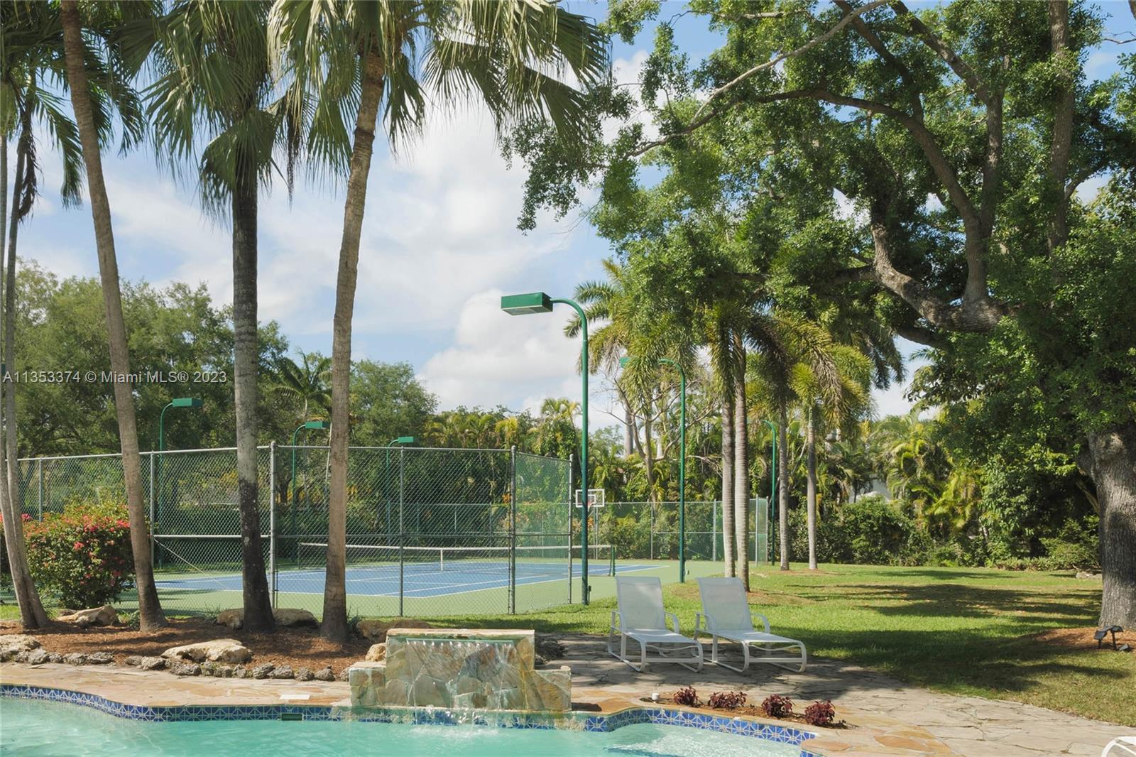 6745 Southwest 94th Street Pinecrest, FL 33156 - Photo 18 of 24 a view of a park with palm trees