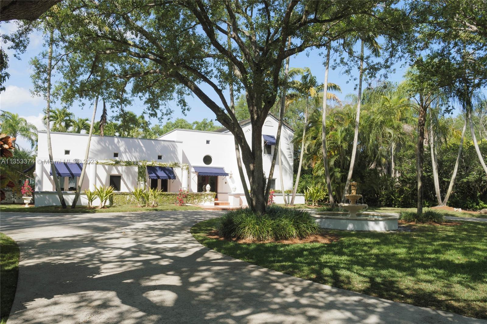 6745 Southwest 94th Street Pinecrest, FL 33156 - Photo 22 of 24 a view of street with houses