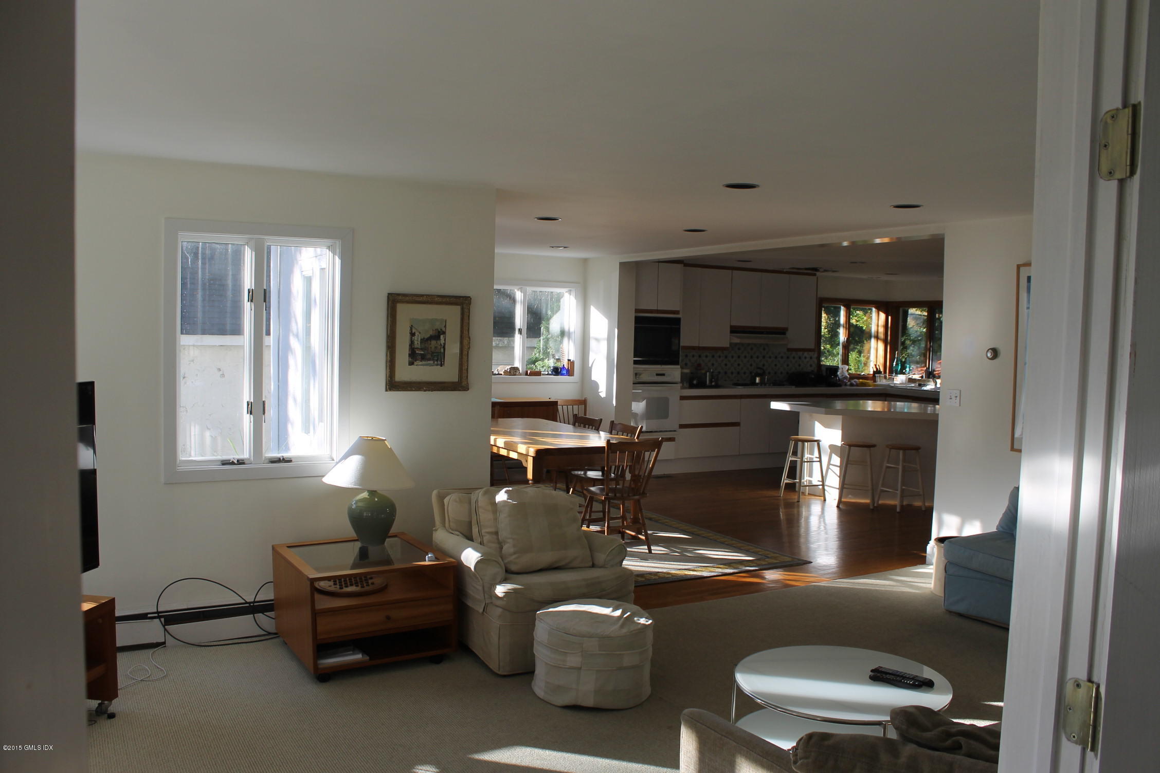 32 Gilliam Lane Riverside, CT 06878 - Photo 2 of 4 a living room with furniture and a flat screen tv