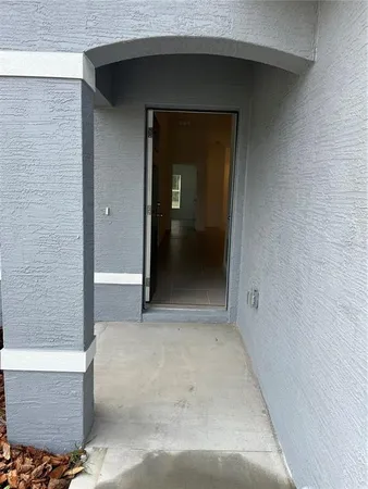 a view of gallery with wooden door