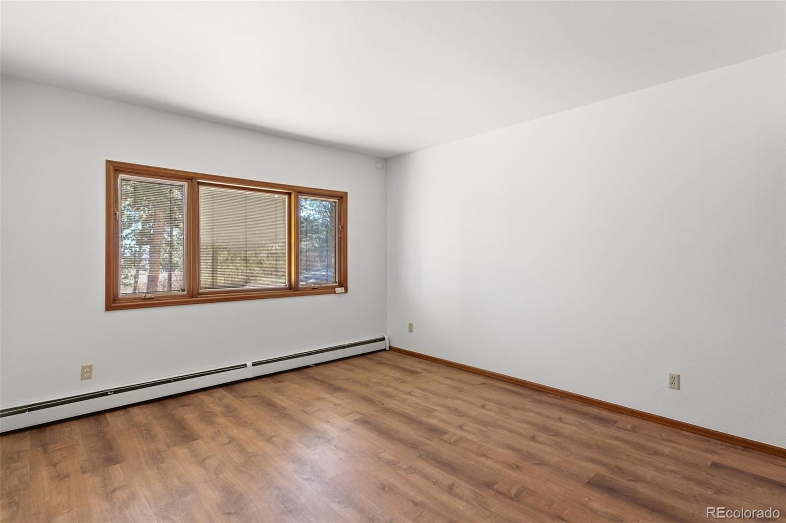 485 West Woodmen Road Colorado Springs, CO 80919 - Photo 41 of 50 an empty room with a window