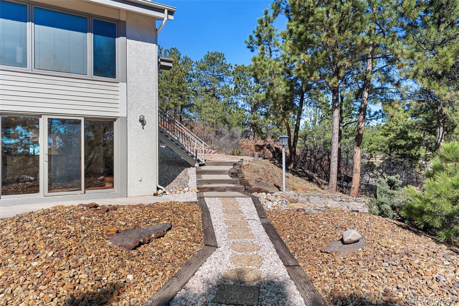 485 West Woodmen Road Colorado Springs, CO 80919 - Photo 47 of 50 a view of a entrance gate of the house
