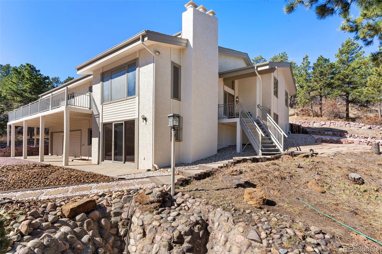 485 West Woodmen Road Colorado Springs, CO 80919 - Photo 50 of 50 a front view of a house with a yard