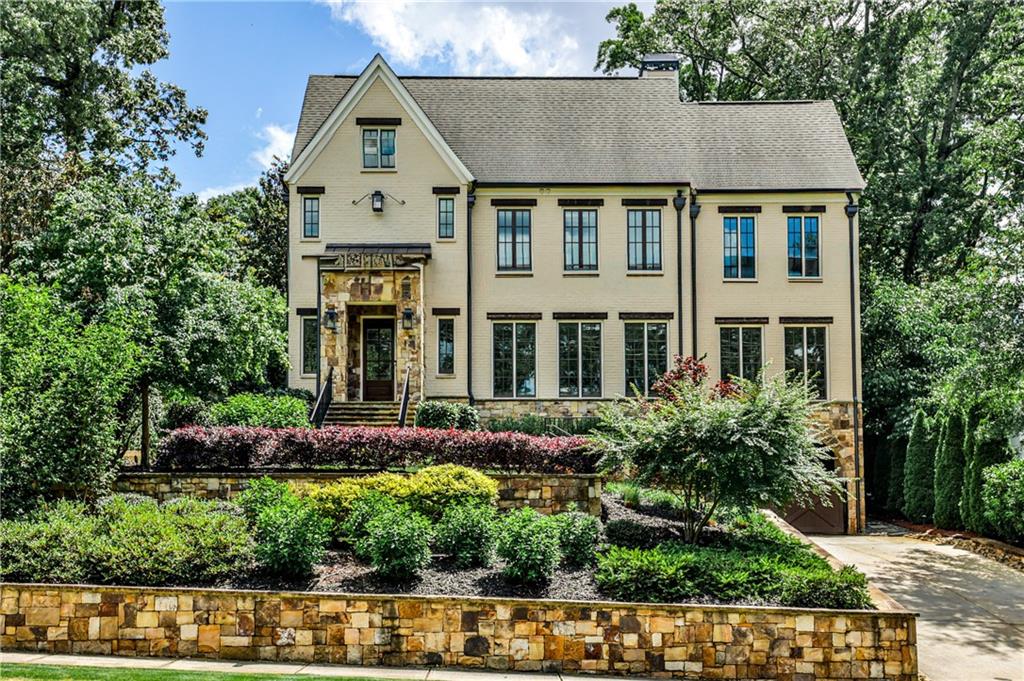 171 Beverly Road Northeast Atlanta, GA 30309 - Photo 1 of 1 front view of a house with a yard