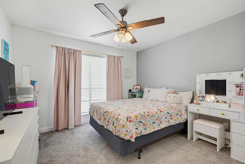 322 West Harwood Road, Unit B Hurst, TX 76054 - Photo 23 of 34 Bedroom 3