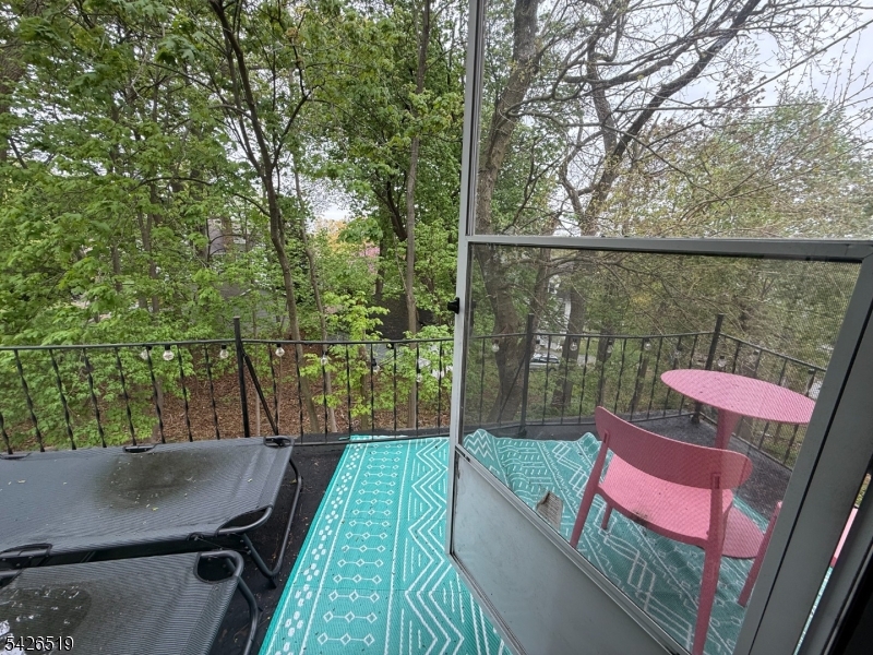 775 Bloomfield Avenue, Unit 2 Montclair, NJ 07042 - Photo 4 of 15 a view of a chairs and table in the balcony