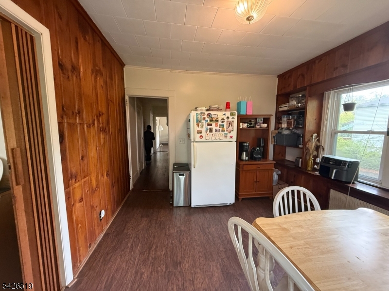 775 Bloomfield Avenue, Unit 2 Montclair, NJ 07042 - Photo 6 of 15 a view of kitchen and dining room with furniture wooden floor and window