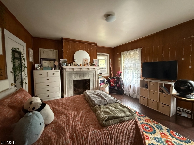 775 Bloomfield Avenue, Unit 2 Montclair, NJ 07042 - Photo 10 of 15 a bedroom with a bed and furniture