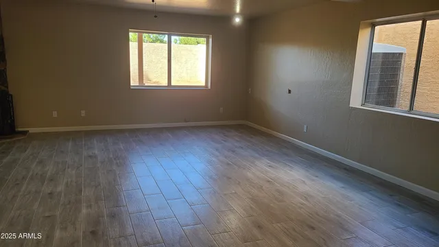 a kitchen with cabinets and stainless steel appliances