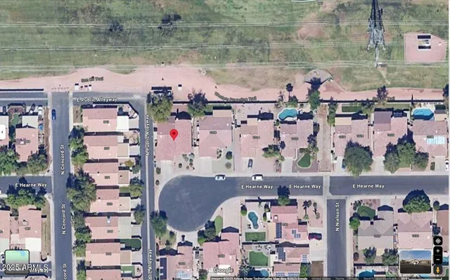 an aerial view of a house with a lake view