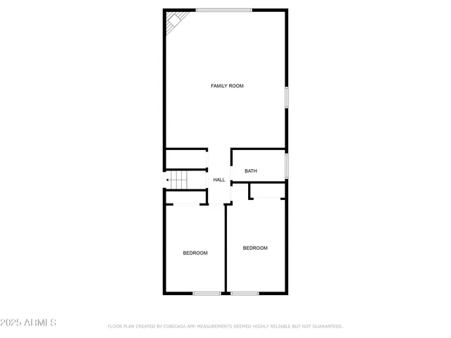 a white house with a potted plant on it