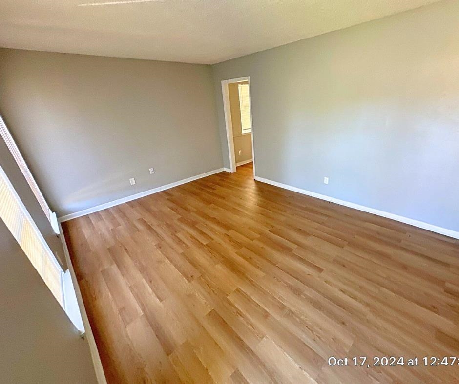 3747 Parakeet Road Memphis, TN 38109 - Photo 4 of 9 Empty room with light wood-type flooring