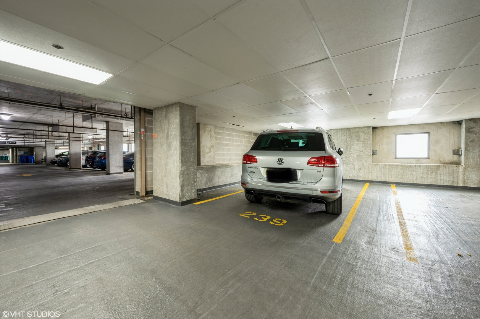 1101 South State Street, Unit H1504 Chicago, IL 60605 - Photo 15 of 16 a car parked in parking room