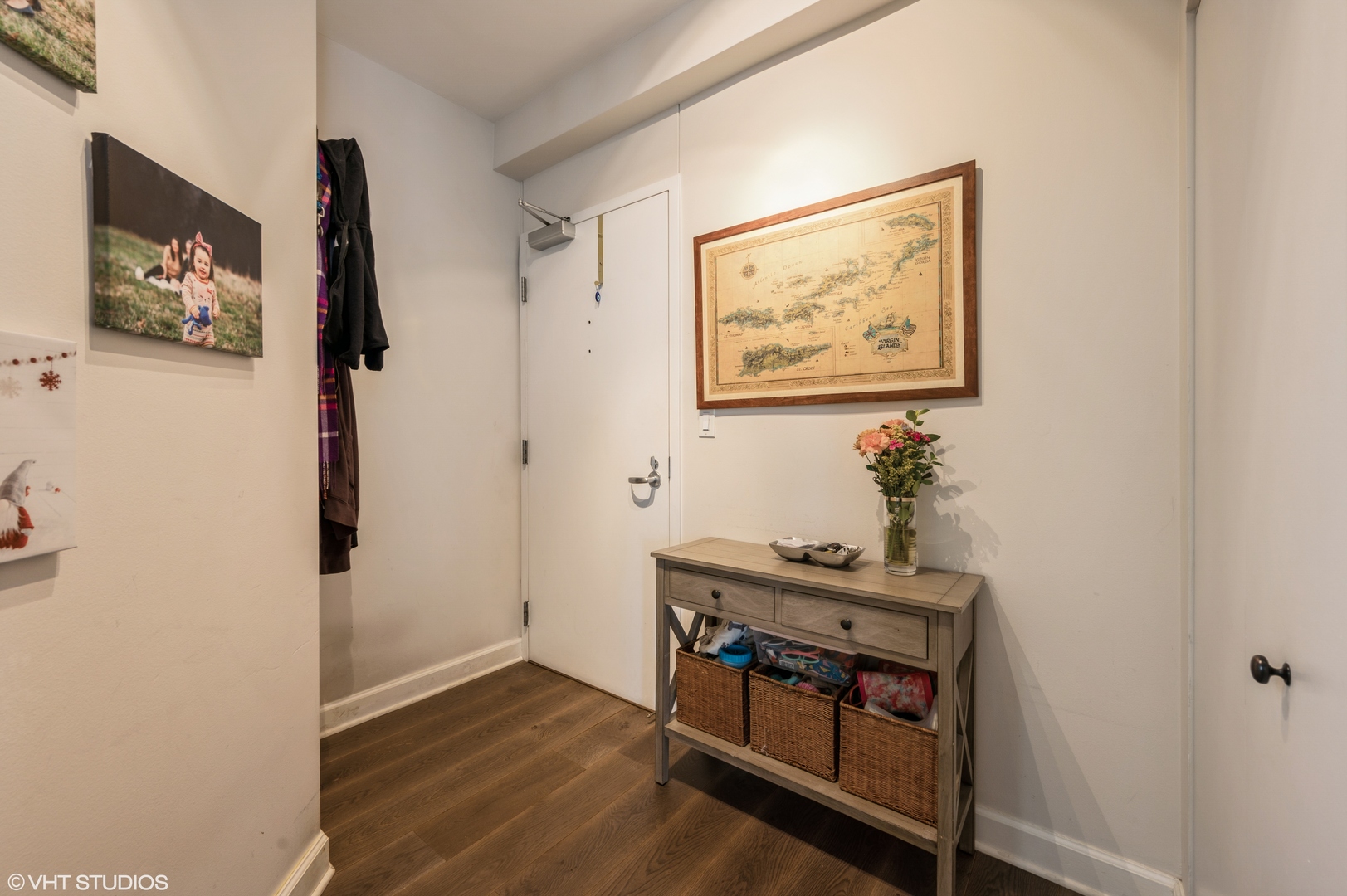 1101 South State Street, Unit H1504 Chicago, IL 60605 - Photo 4 of 16 a room with furniture and wooden floor