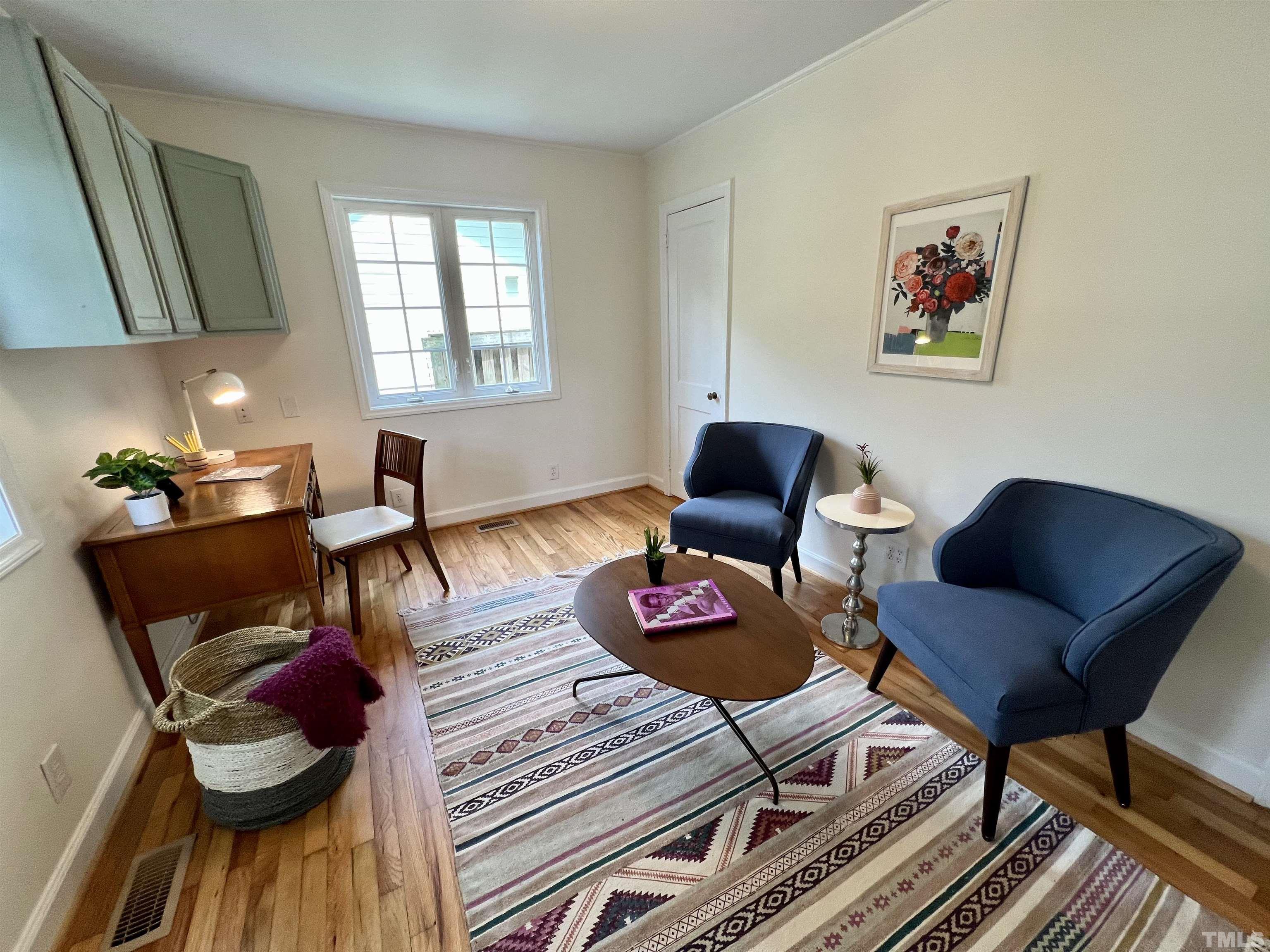 1720 Bennett Street Raleigh, NC 27604 - Photo 14 of 46 a living room with furniture and a window