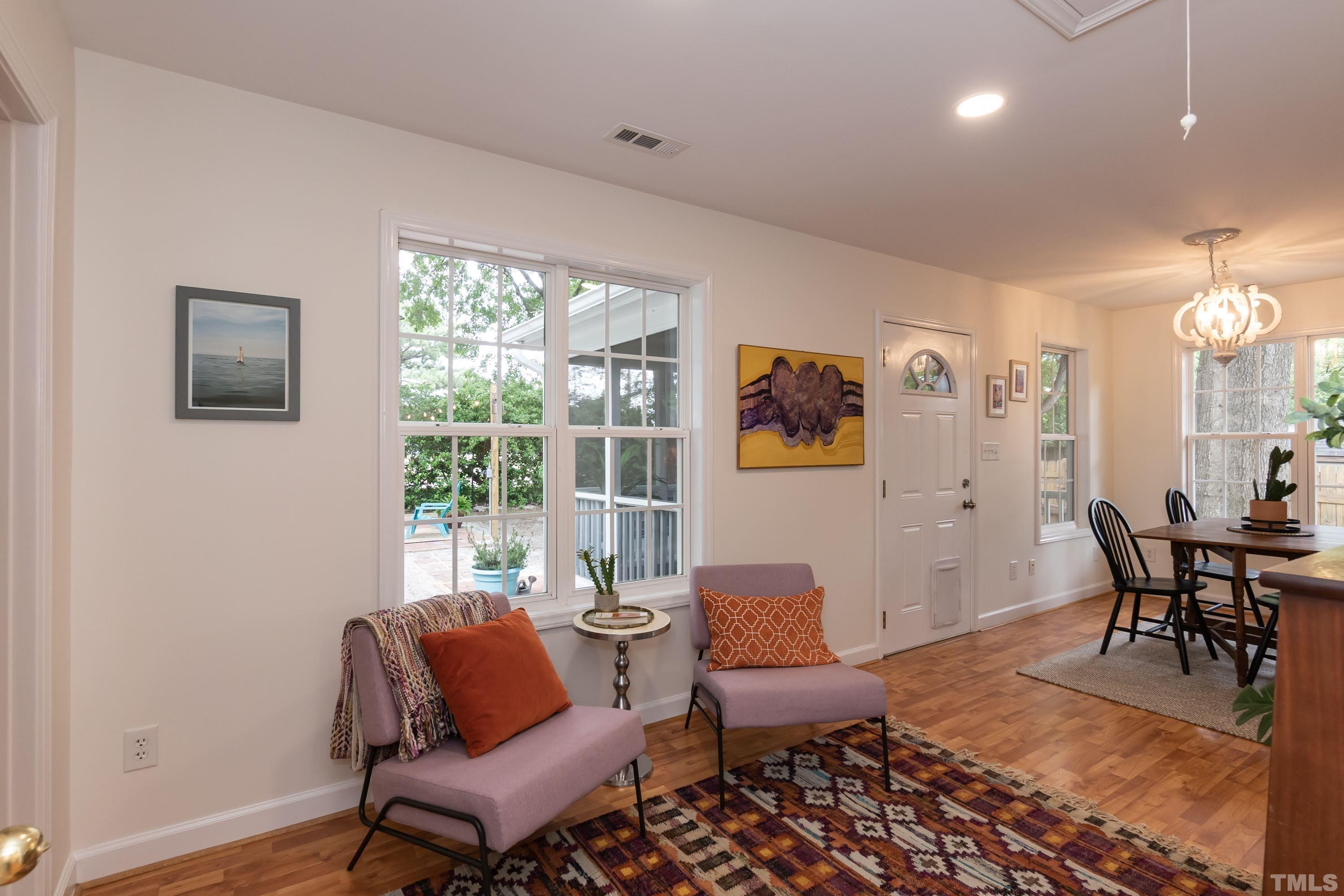 1720 Bennett Street Raleigh, NC 27604 - Photo 21 of 46 a living room with furniture and a large window