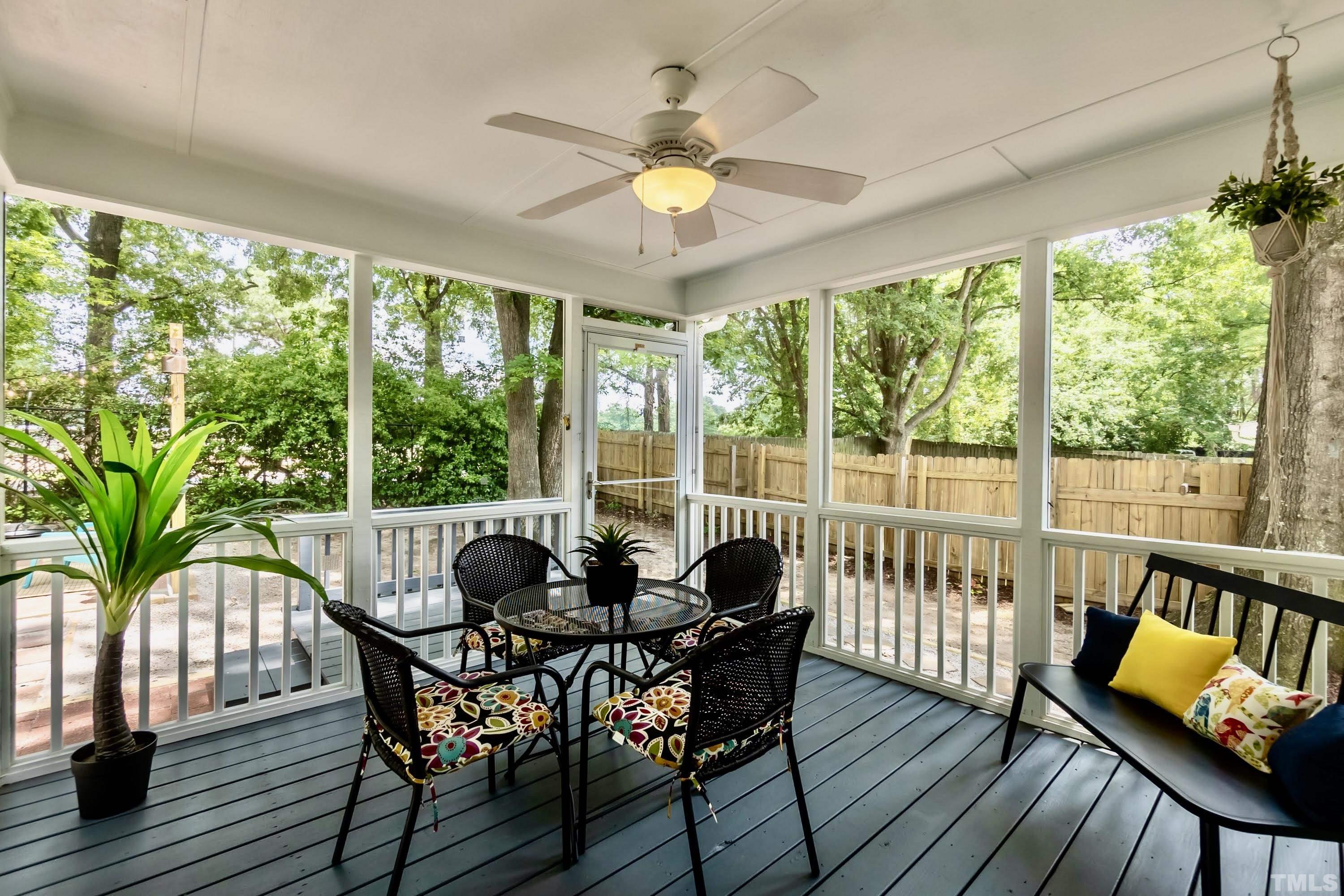 1720 Bennett Street Raleigh, NC 27604 - Photo 25 of 46 a dining room with furniture garden view and wooden floor