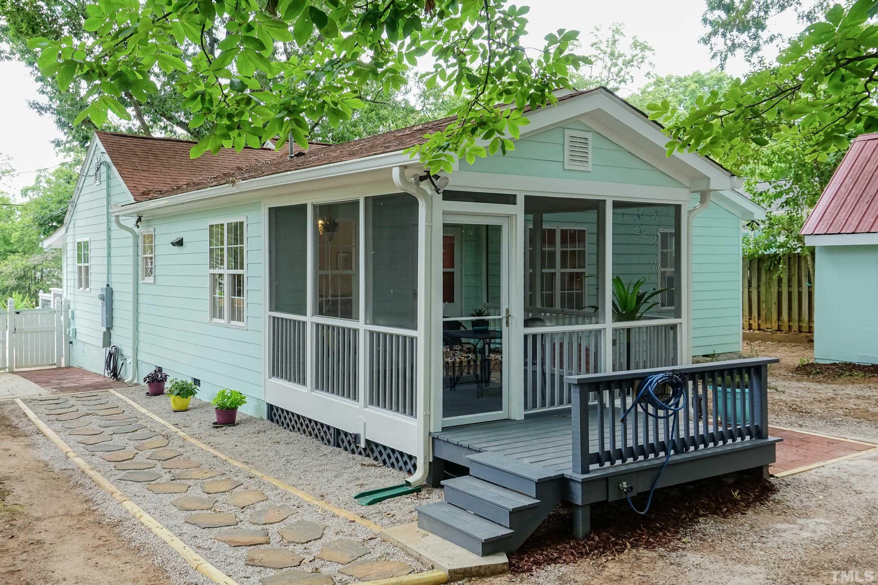 1720 Bennett Street Raleigh, NC 27604 - Photo 26 of 46 a view of a wooden deck and a yard