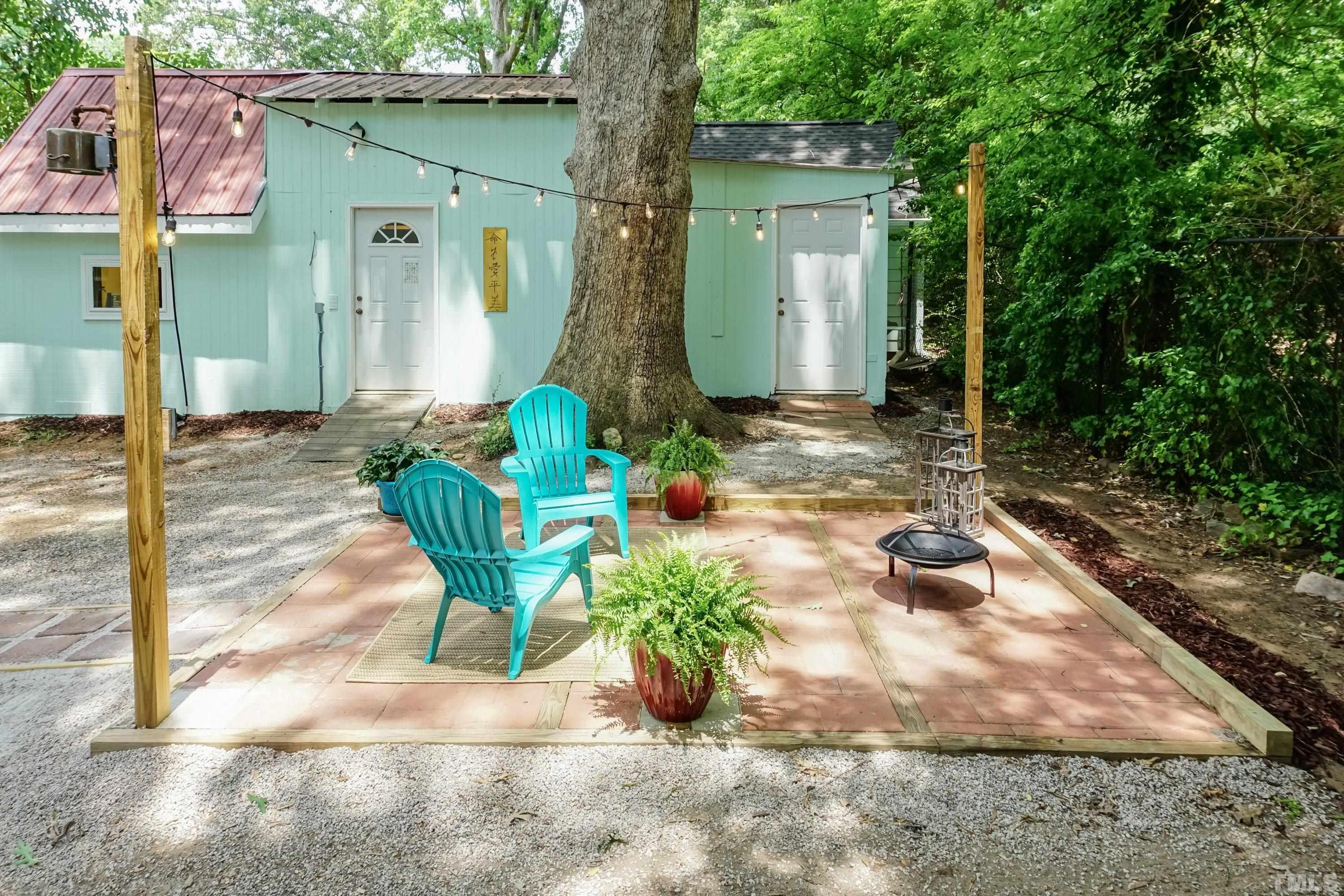 1720 Bennett Street Raleigh, NC 27604 - Photo 28 of 46 a view of a house with backyard and sitting area