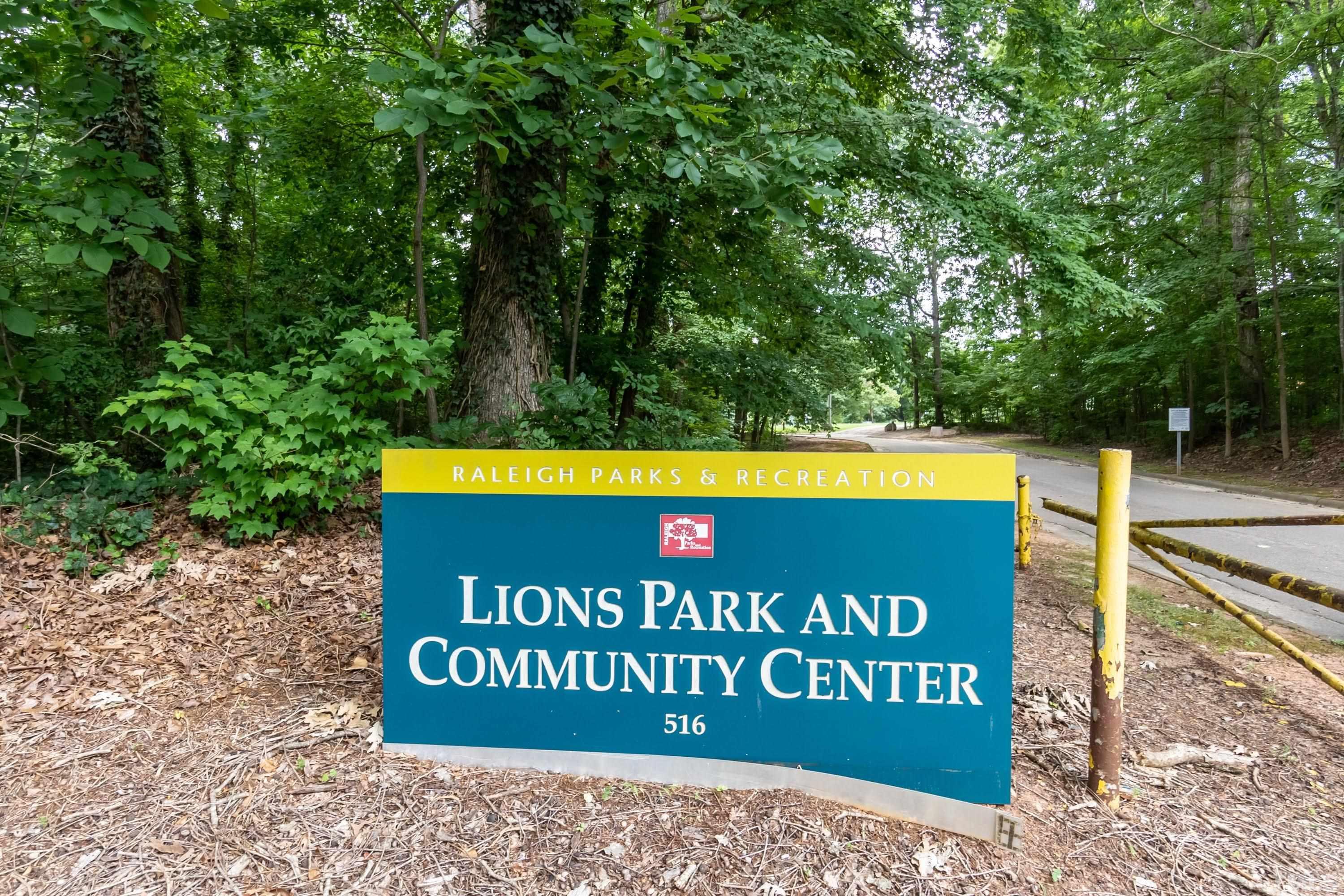 1720 Bennett Street Raleigh, NC 27604 - Photo 35 of 46 a sign that is sitting on a wooden wall
