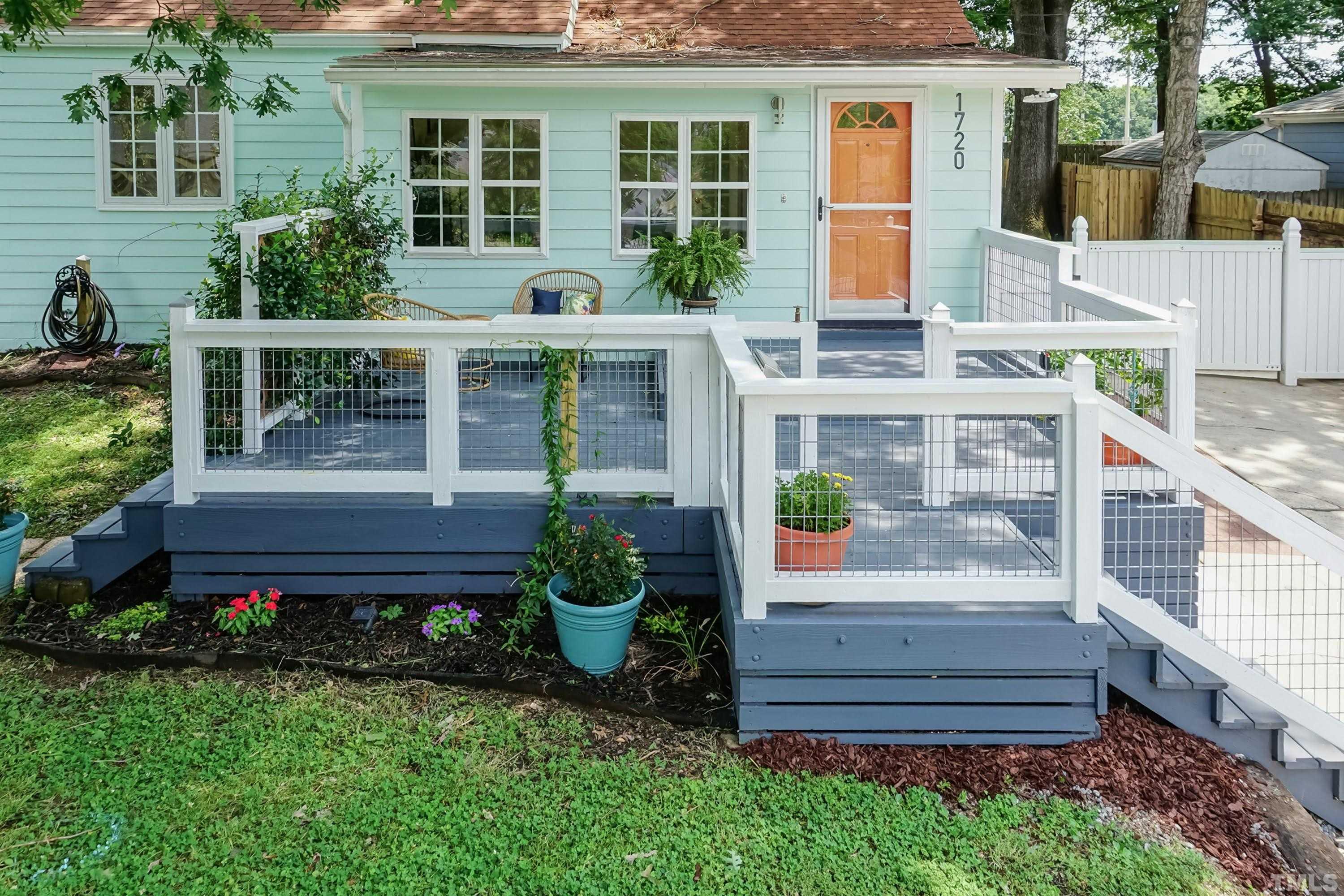 1720 Bennett Street Raleigh, NC 27604 - Photo 44 of 46 a front view of a house with a garden