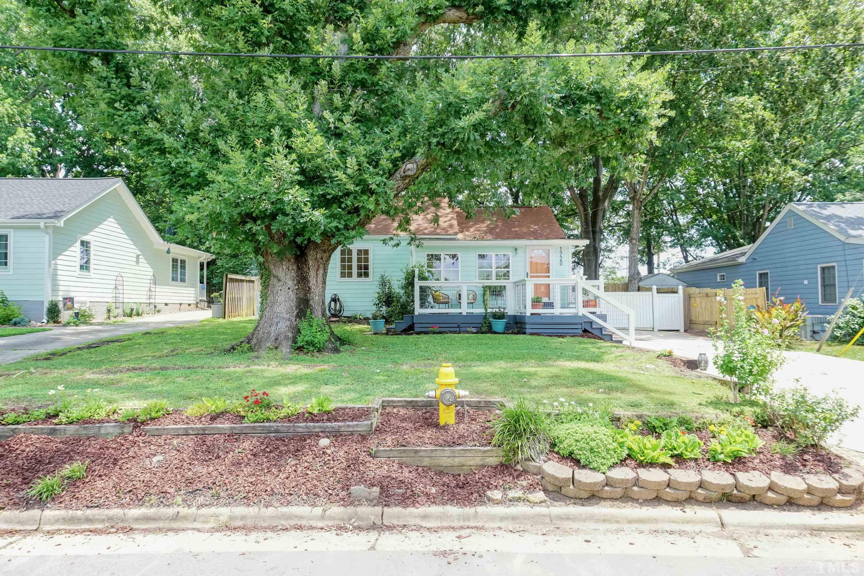 1720 Bennett Street Raleigh, NC 27604 - Photo 46 of 46 a front view of a house with a yard