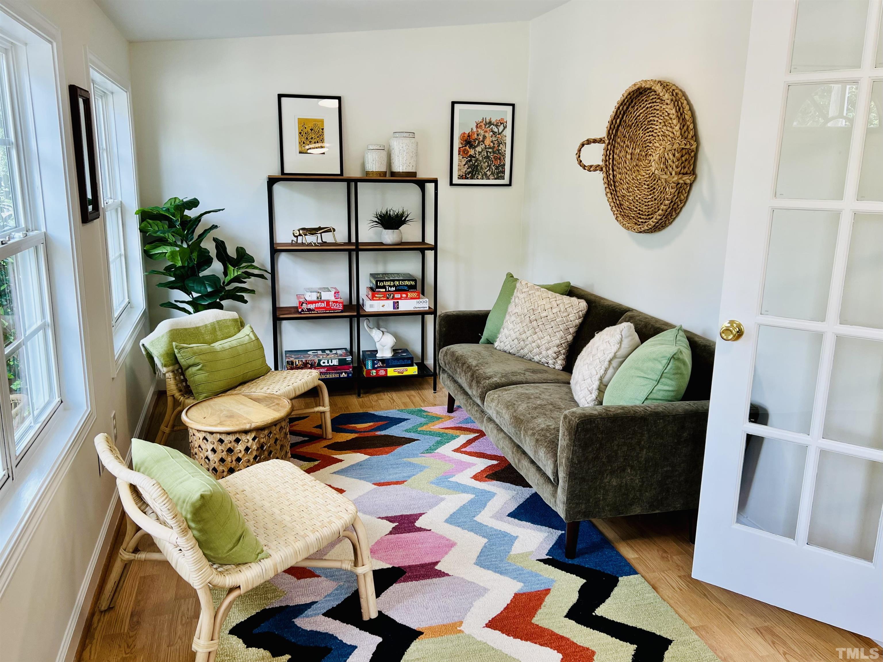 1720 Bennett Street Raleigh, NC 27604 - Photo 5 of 46 a living room with furniture and a bookshelf