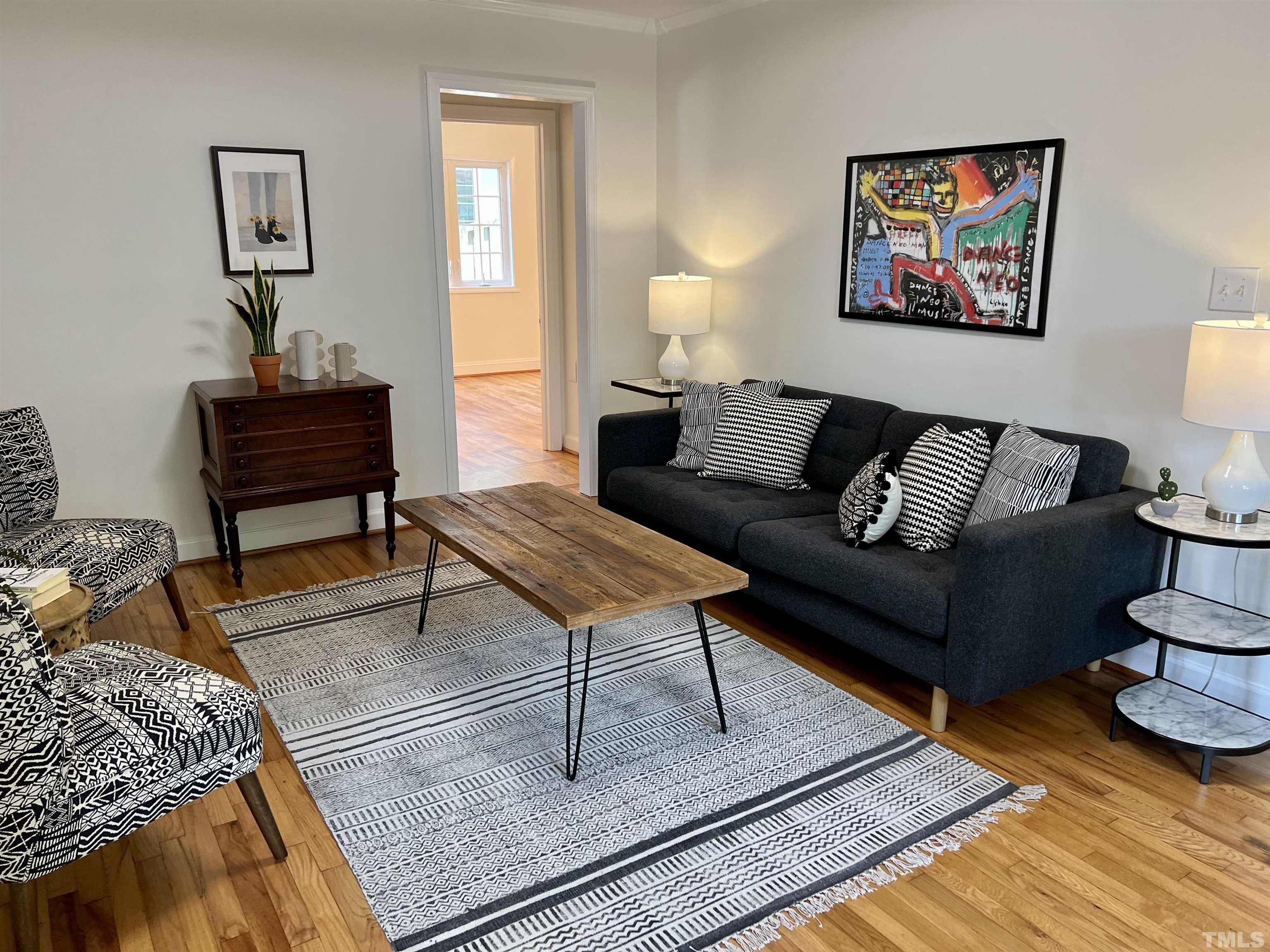 1720 Bennett Street Raleigh, NC 27604 - Photo 10 of 46 a living room with furniture and a rug