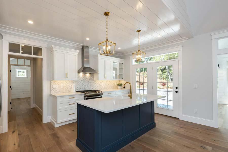 55 Palmer Road Mashpee, MA 02649 - Photo 12 of 42 a kitchen with stainless steel appliances granite countertop a sink and a stove