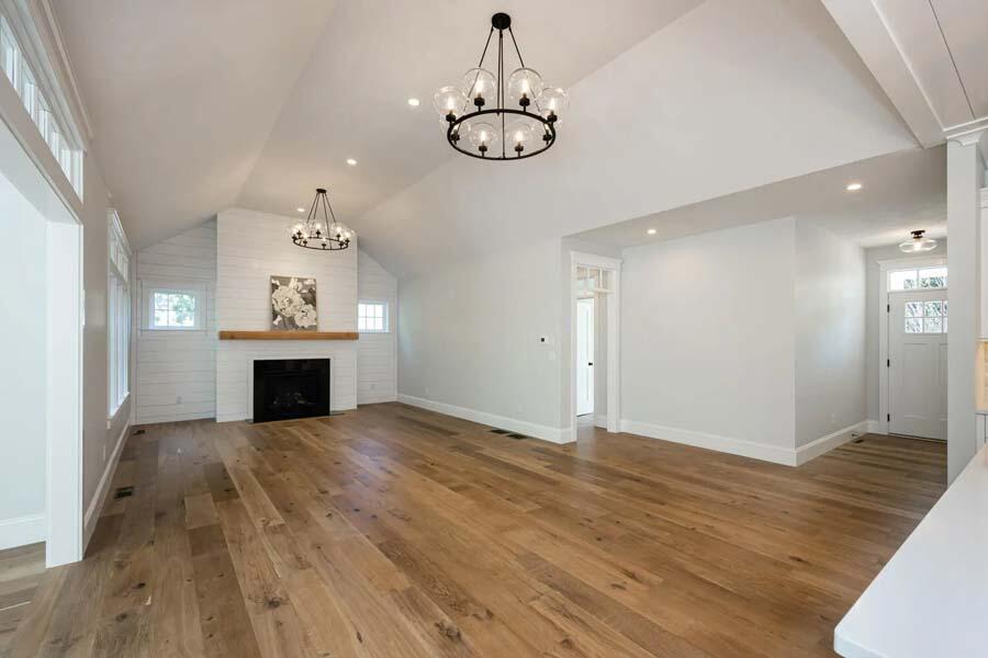 55 Palmer Road Mashpee, MA 02649 - Photo 15 of 42 a view of empty room with wooden floor and fireplace