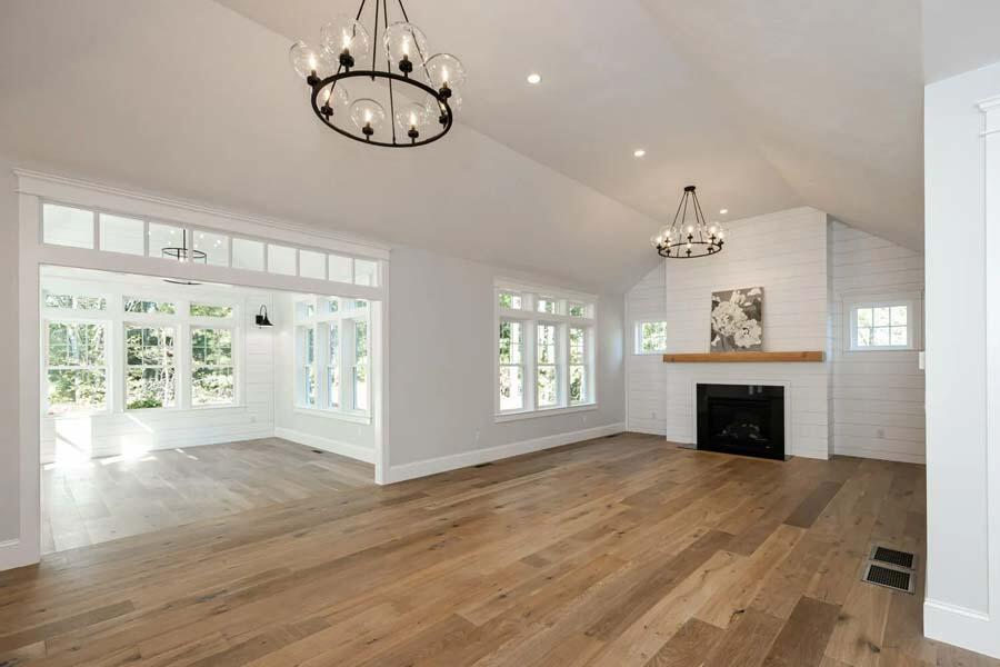 55 Palmer Road Mashpee, MA 02649 - Photo 17 of 42 a view of an empty room with a fireplace and a window