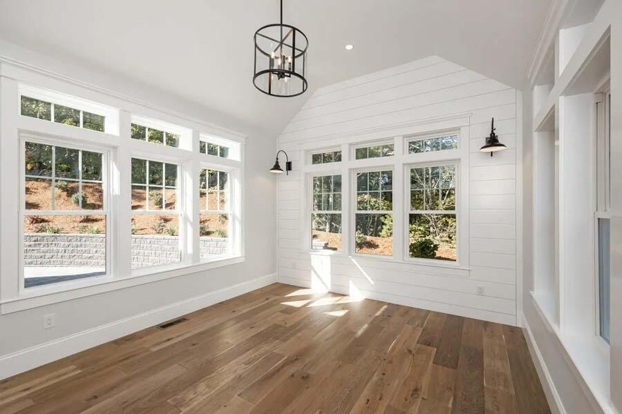 55 Palmer Road Mashpee, MA 02649 - Photo 18 of 42 a view of an empty room with a window and wooden floor