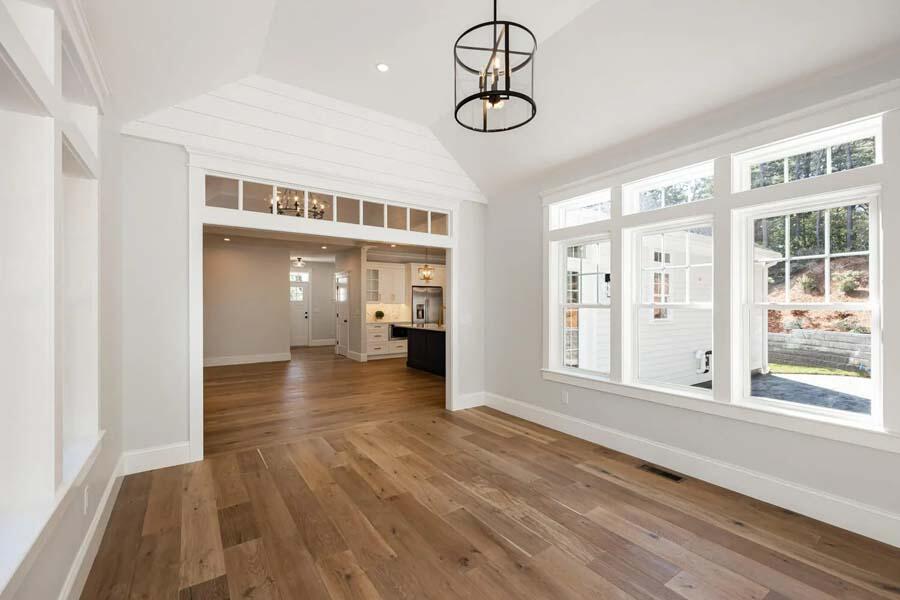 55 Palmer Road Mashpee, MA 02649 - Photo 19 of 42 a view of a hallway with wooden floor and a window