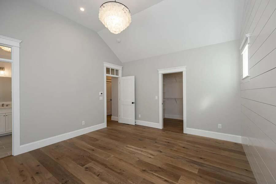 55 Palmer Road Mashpee, MA 02649 - Photo 22 of 42 an empty room with wooden floor and windows