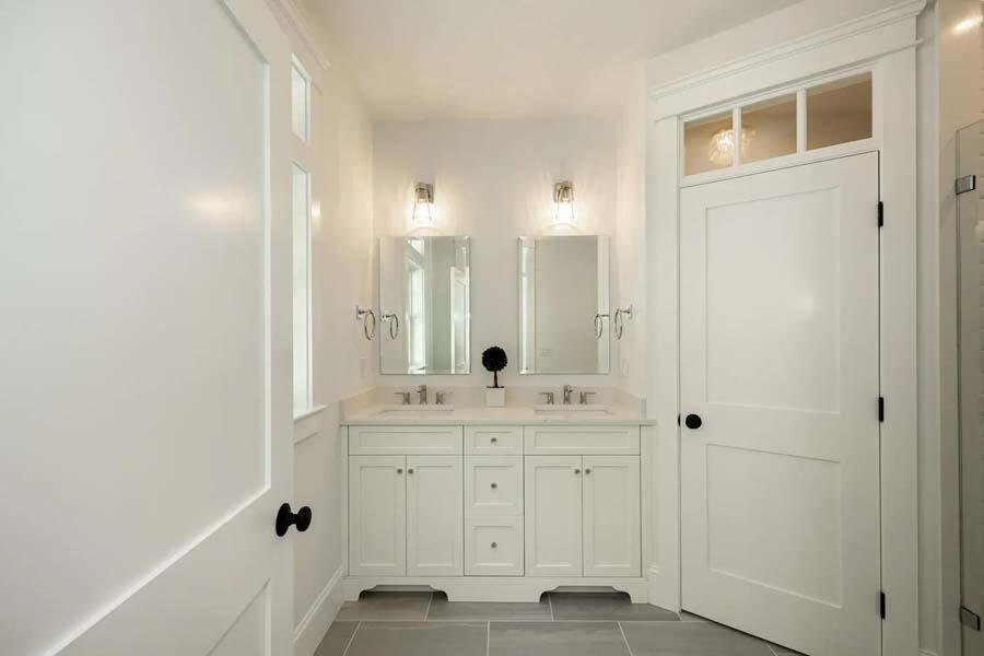 55 Palmer Road Mashpee, MA 02649 - Photo 25 of 42 a spacious bathroom with a shower a sink and a mirror