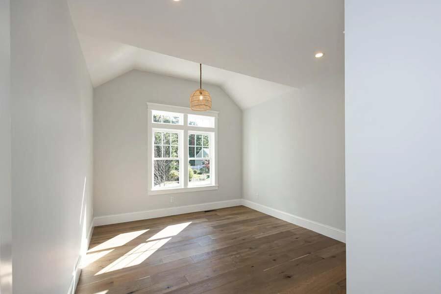 55 Palmer Road Mashpee, MA 02649 - Photo 30 of 42 an empty room with wooden floor and windows