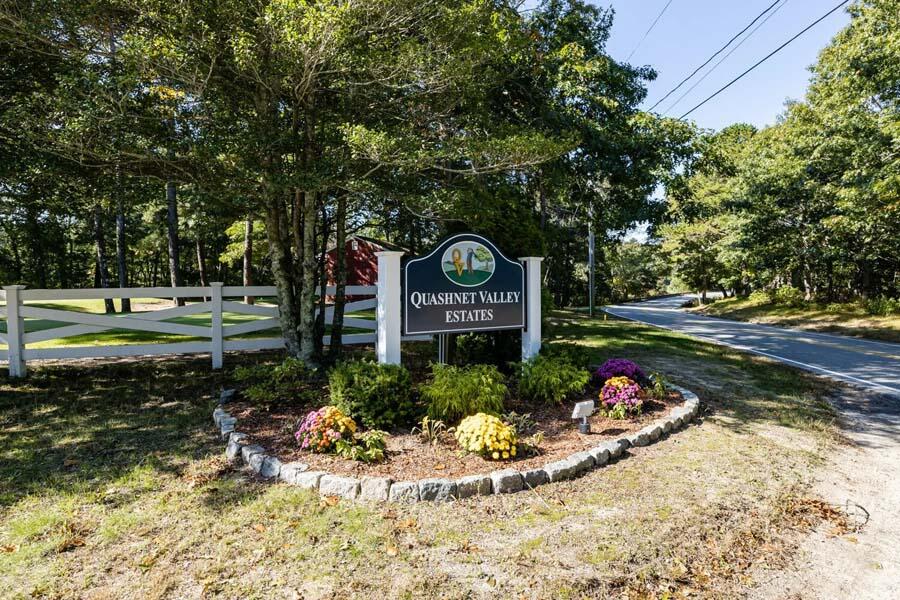 55 Palmer Road Mashpee, MA 02649 - Photo 38 of 42 a view of a park that has a tree on the side of it