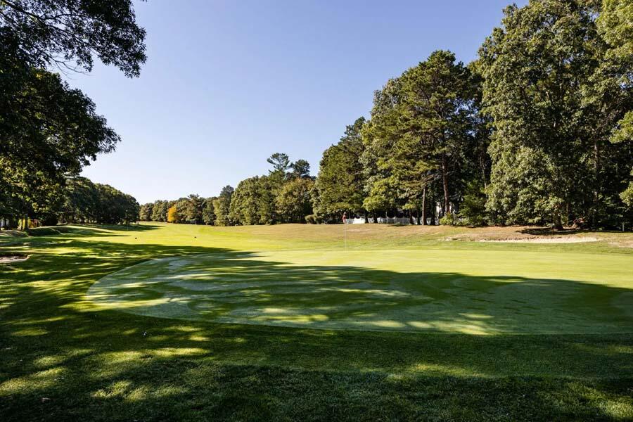 55 Palmer Road Mashpee, MA 02649 - Photo 42 of 42 a view of a swimming pool with an outdoor space and seating area