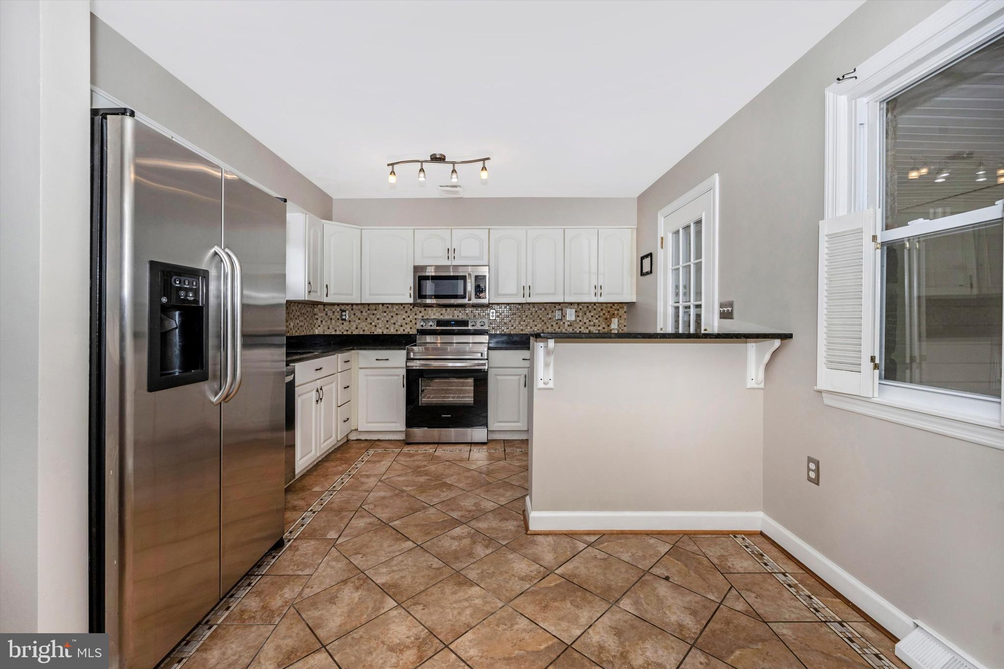 1724 Bollinger Road Westminster, MD 21157 - Photo 16 of 71 Stainless appliances with new stove