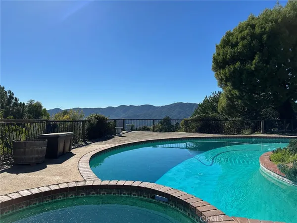 a view of swimming pool and lake view