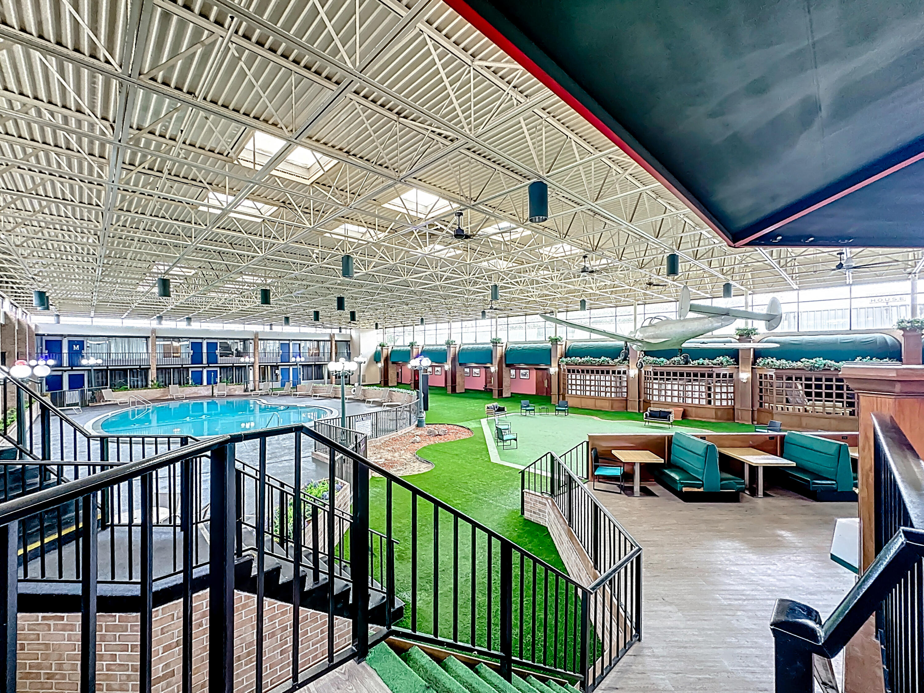 910 Suemac Road Jacksonville, FL 32254 - Photo 4 of 32 a view of a balcony with chairs and potted plants
