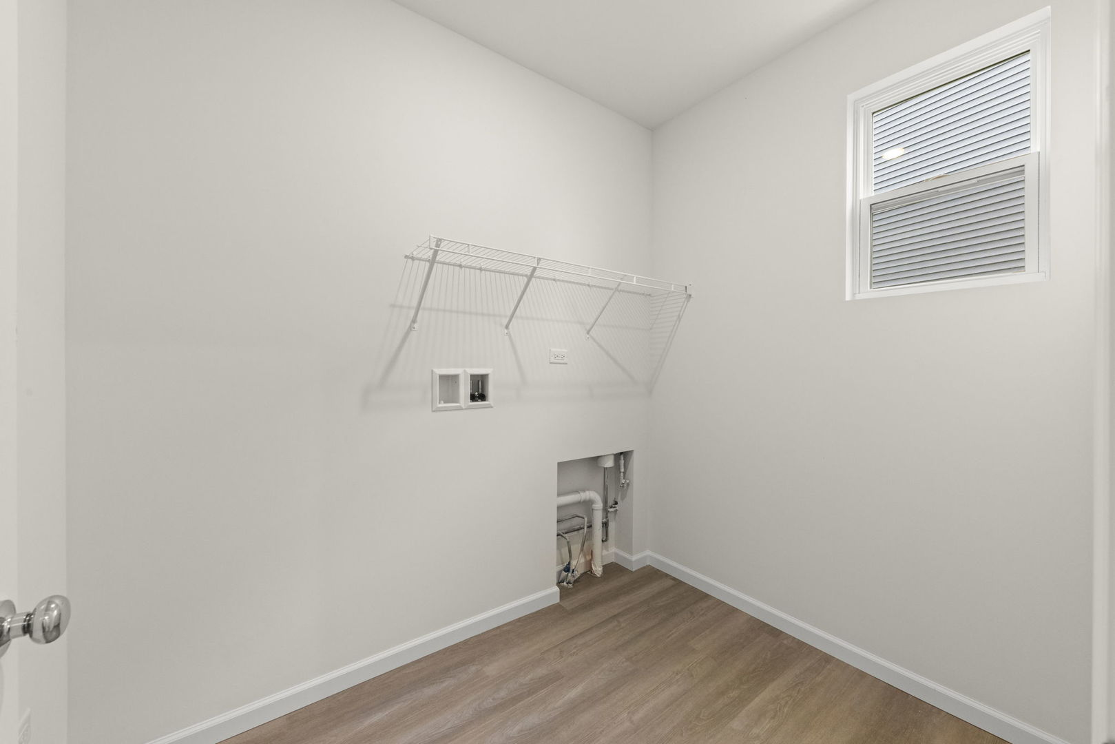 2416 Tailshot Road Plainfield, IL 60585 - Photo 11 of 27 a view of a room with rack on the wall