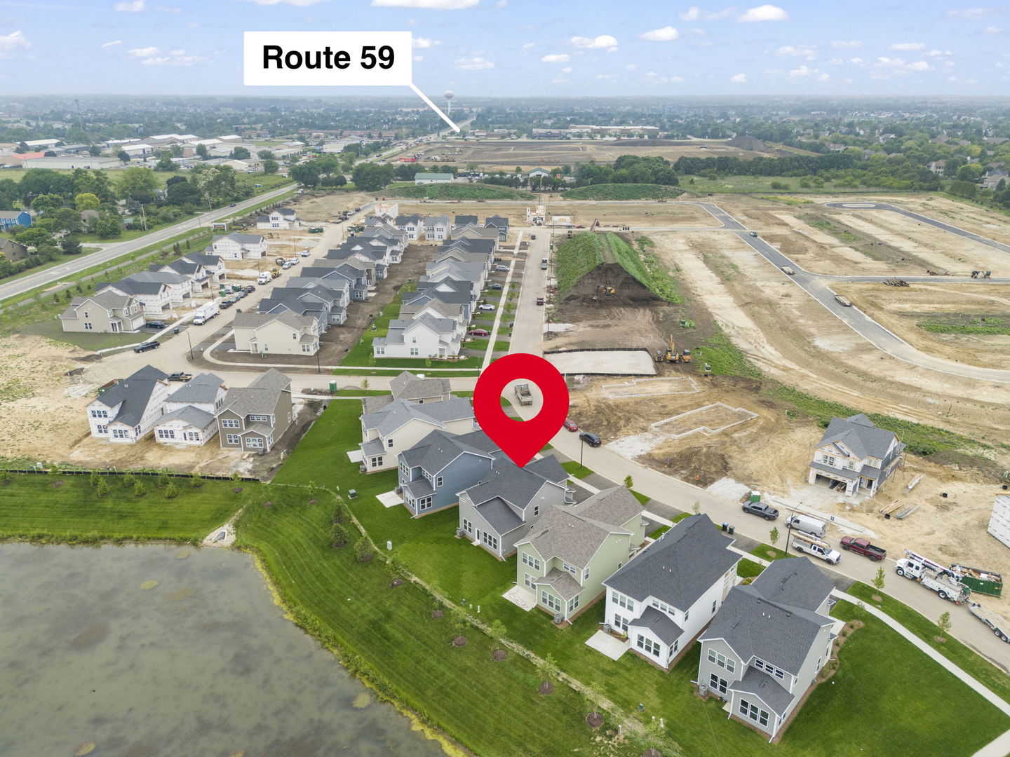 2416 Tailshot Road Plainfield, IL 60585 - Photo 22 of 27 a view of a city street with a lake view