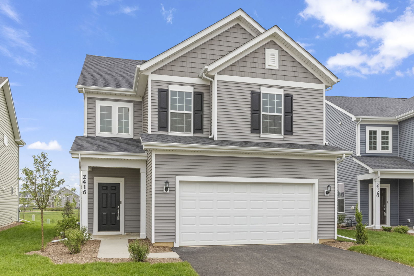 2416 Tailshot Road Plainfield, IL 60585 - Photo 27 of 27 a front view of a house with garden
