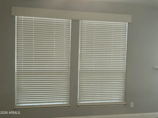 a view of a room that has a window in it